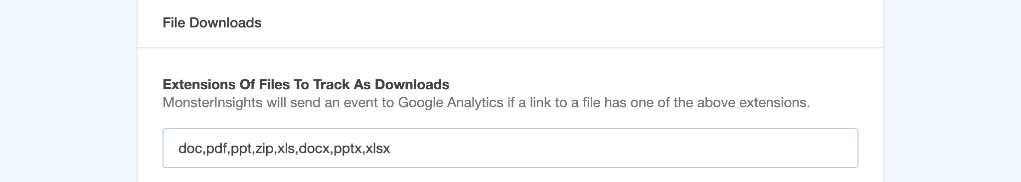 MonsterInsights Engagement settings showing the File Downloads tracked extensions field