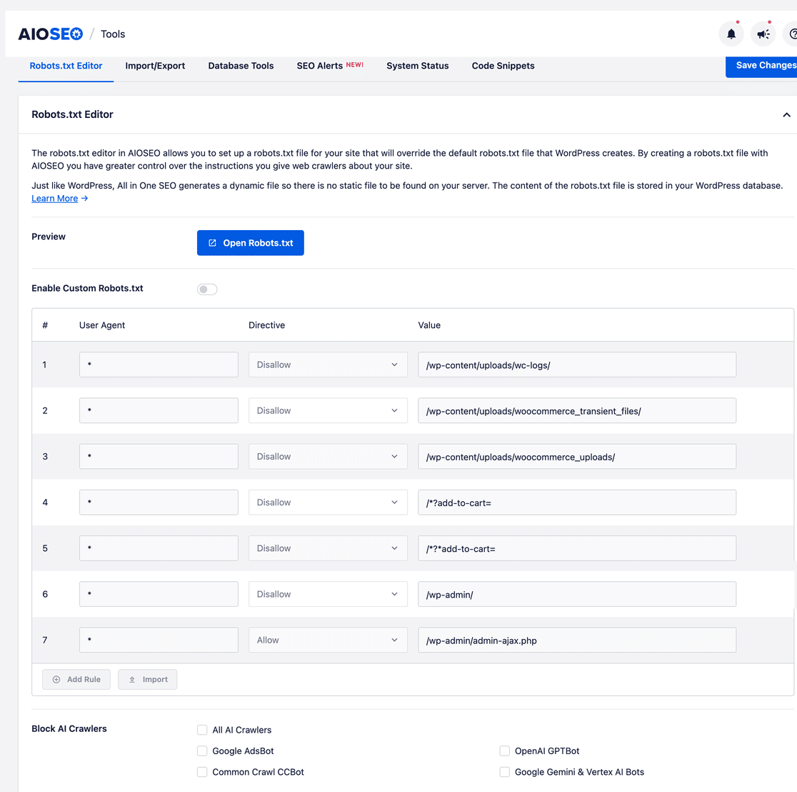 AIOSEO Robots.txt Editor showing the Enable Custom Robots.txt toggle, the rule table with Add Rule button, and the Block AI Crawlers checkbox panel