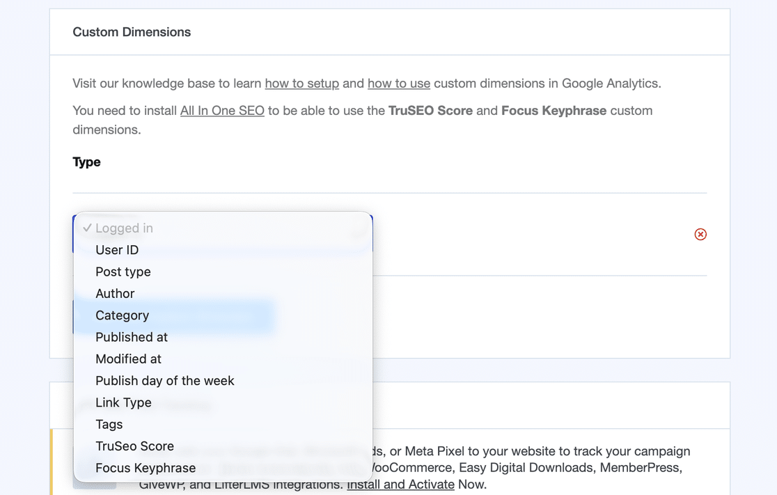 MonsterInsights Custom Dimensions Type dropdown open, showing Focus Keyphrase and TruSeo Score as selectable options once All in One SEO is installed