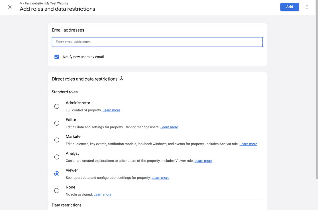 The Add roles and data restrictions panel in Google Analytics showing the Administrator, Editor, Marketer, Analyst, Viewer and None roles